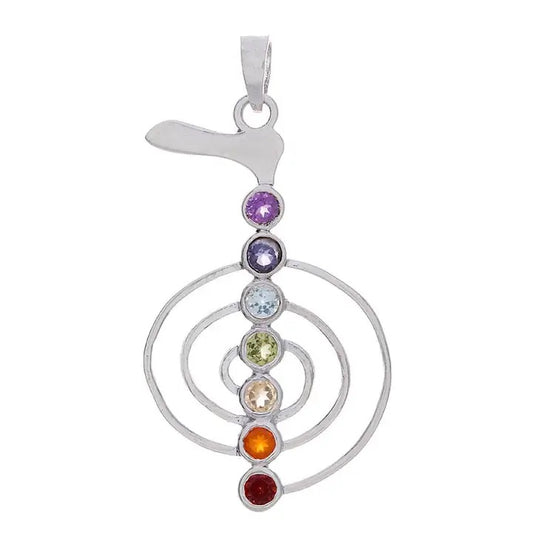 Silver pendant with colorful gemstones on a white background