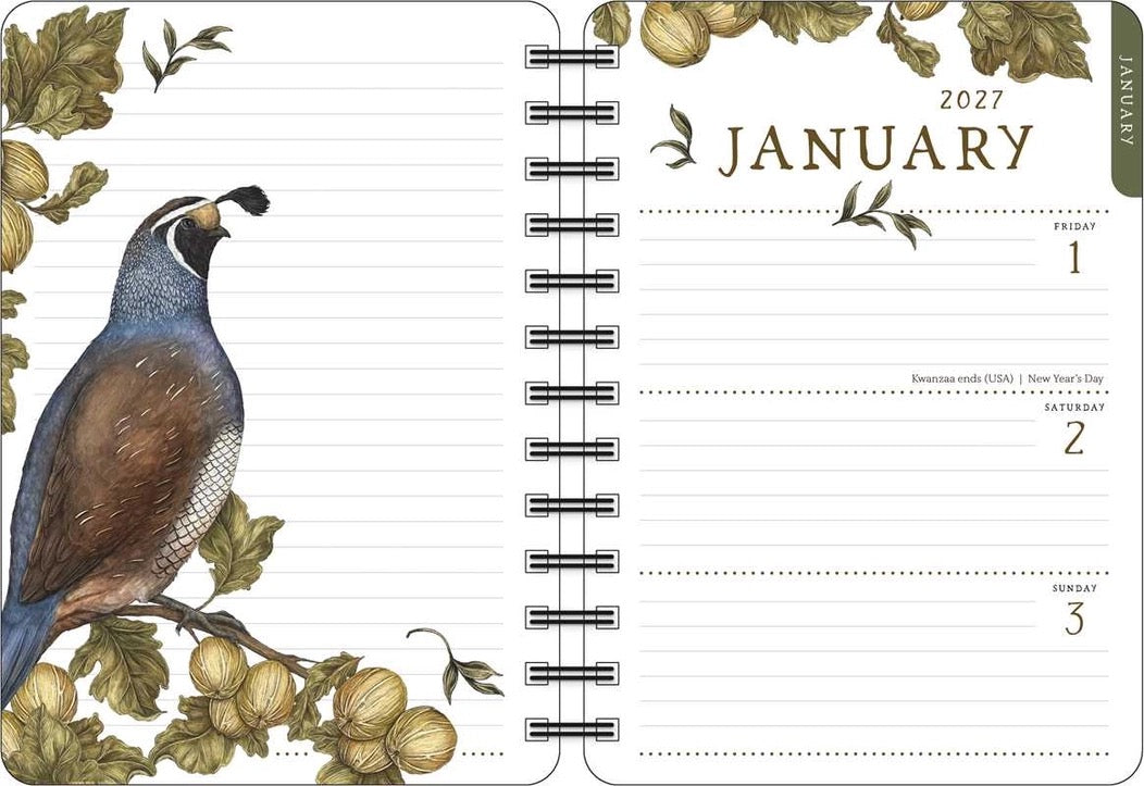 An open spiral-bound planner or calendar spread showing the January 2027 page. The left side features an illustrated quail perched among leaves and acorns, while the right side has lined writing space with the month 'January' and dates 1 through 3 visible.