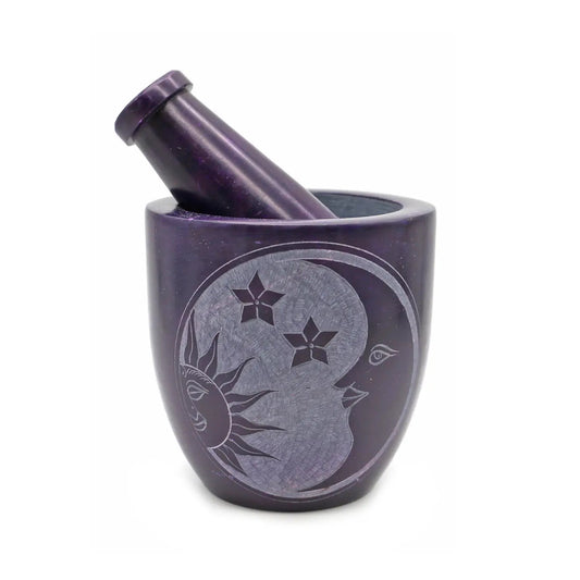 Purple mortar and pestle with celestial design on a white background