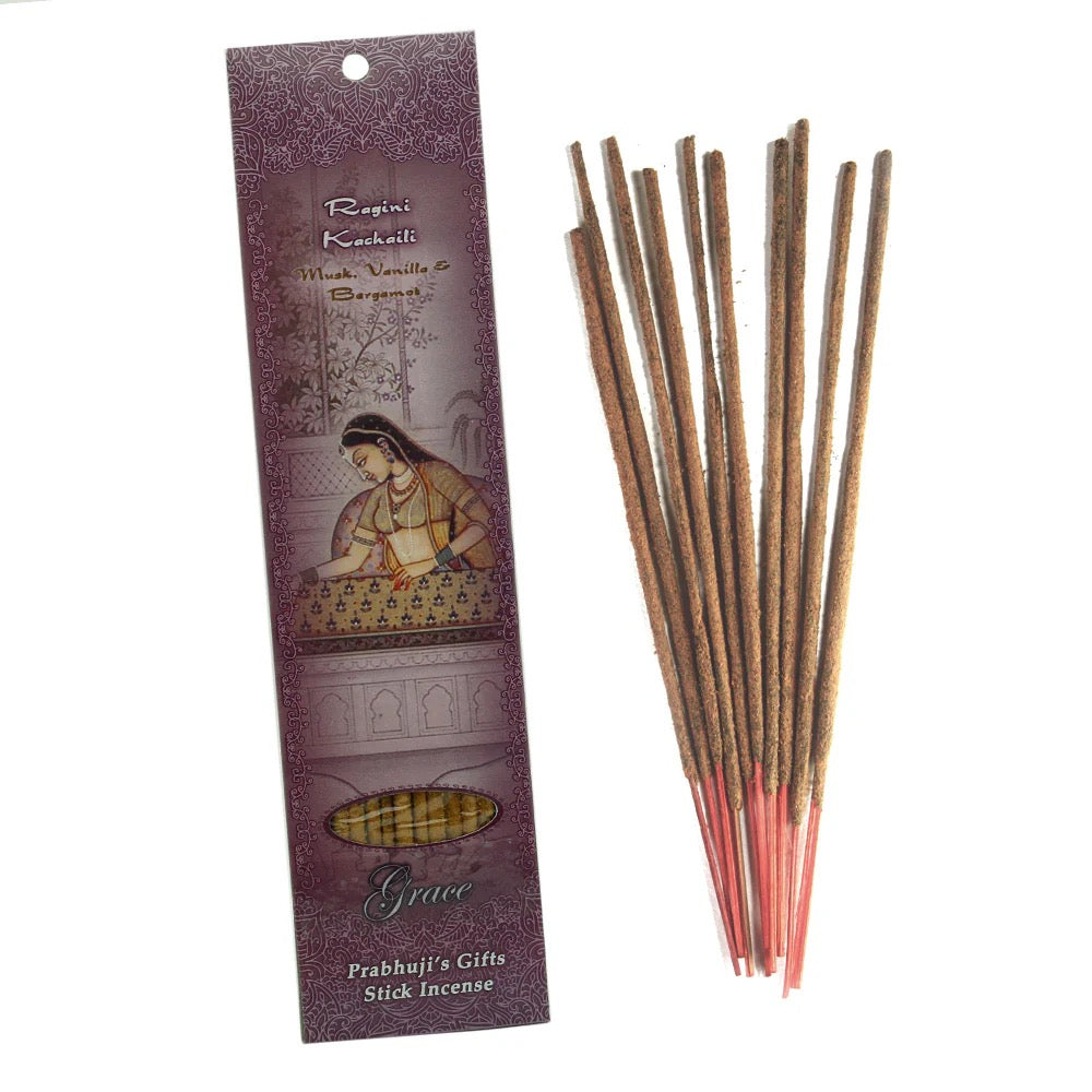 Incense sticks with their packaging on a white background