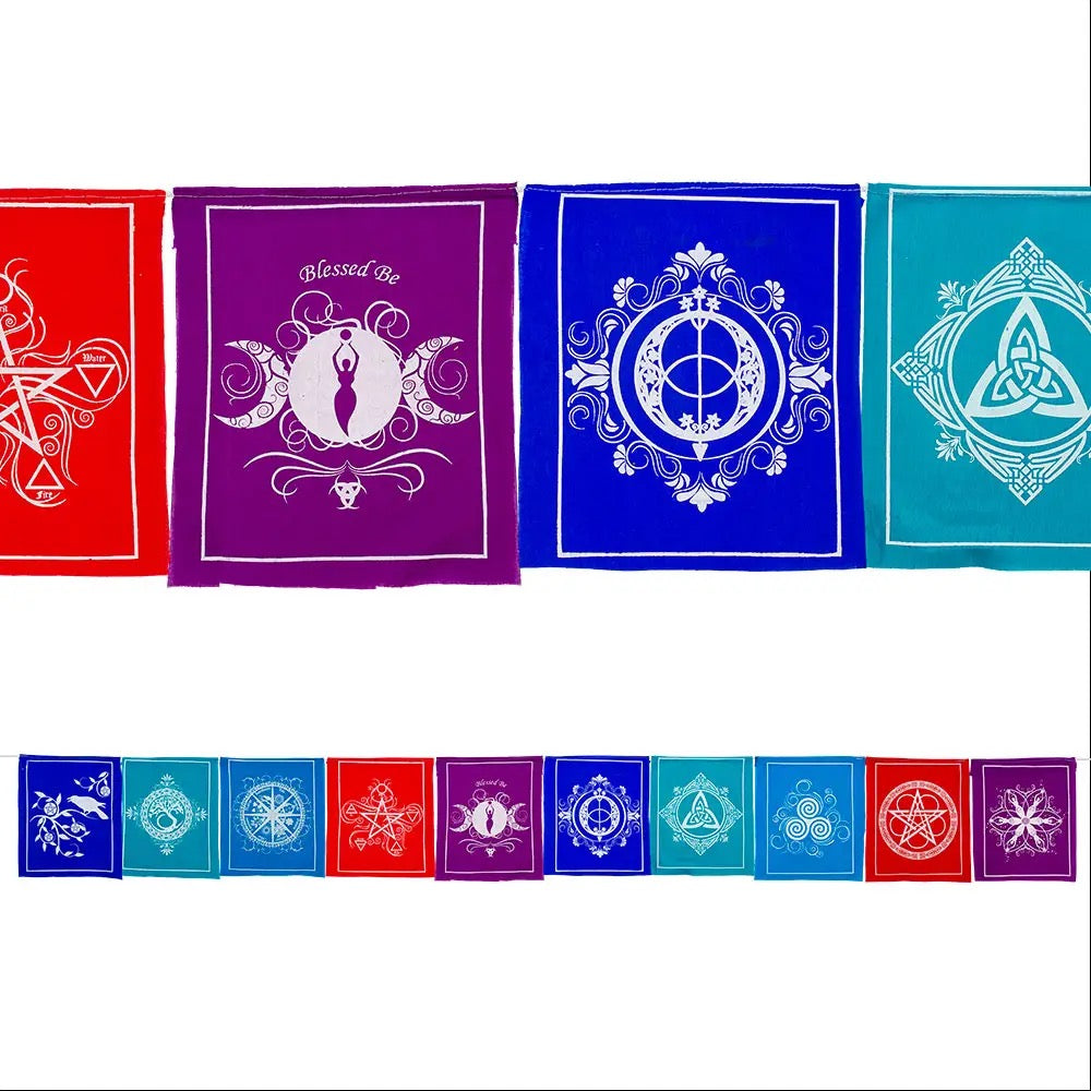 Set of colorful fabric panels with various symbols on a white background