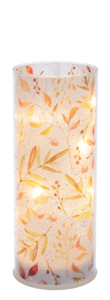Cylindrical candle with leaf pattern on a white background 3x8 in