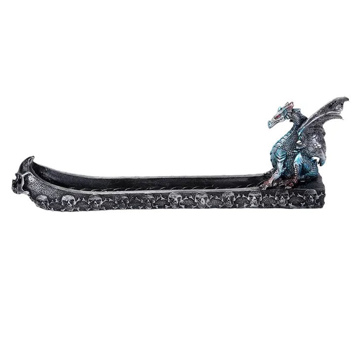 A gothic-style dragon figurine shaped like a long, low tray or boat, with a detailed blue and red dragon perched on the right end, set against a plain white background.