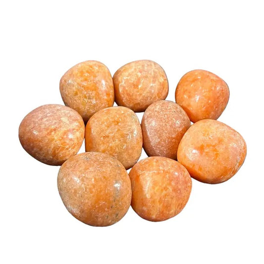 Orange-colored spherical objects on a white background