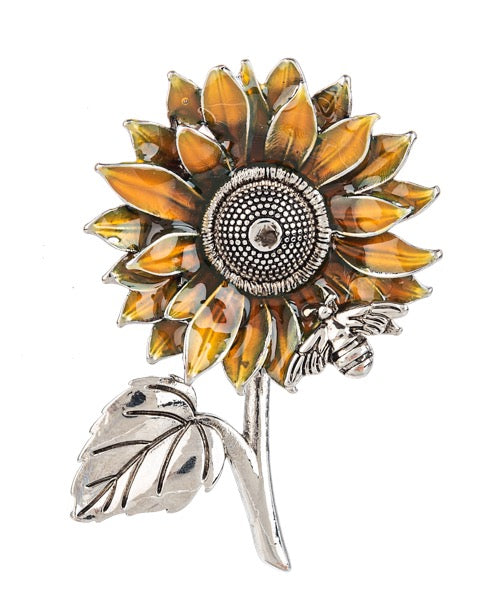 Sunflower-shaped charm with a bee on a white background