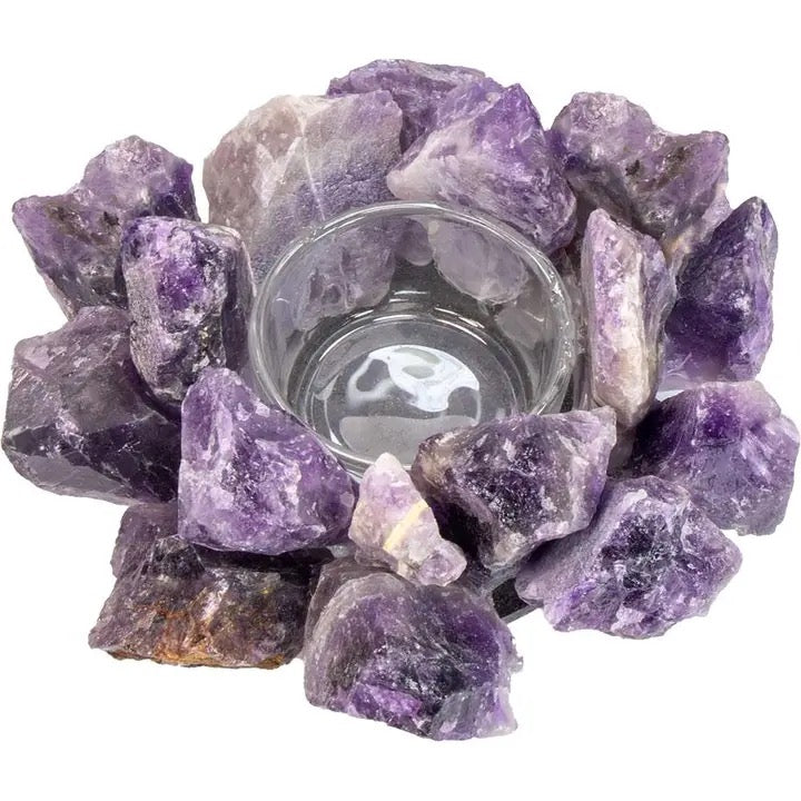 Amethyst crystal candle holder on a white background