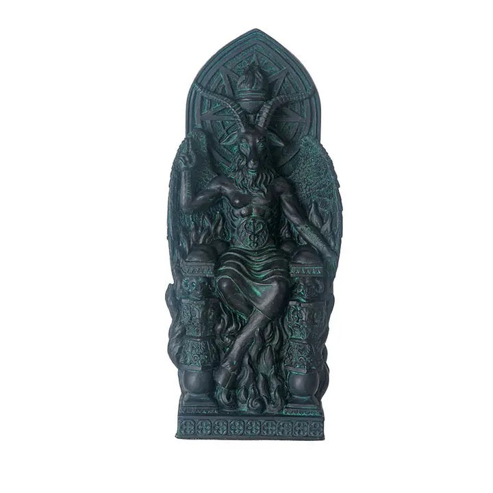 Decorative statue with intricate design on a white background