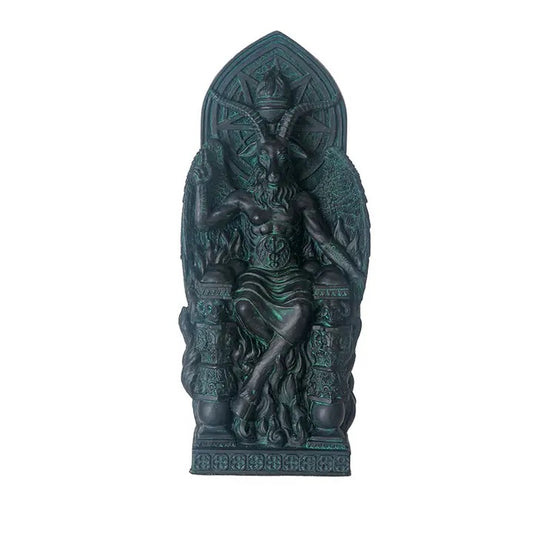 Decorative statue with intricate design on a white background