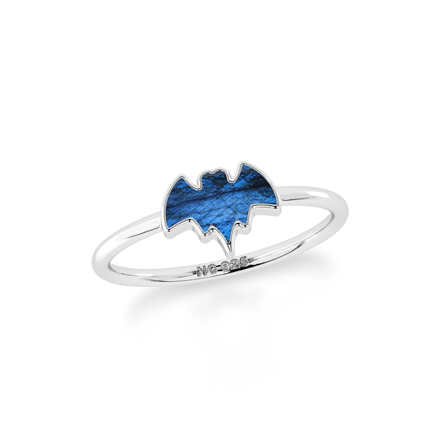 Silver ring with a blue bat-shaped design on a white background