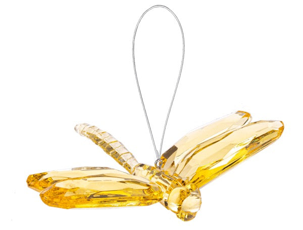 Clear plastic Yellow butterfly ornament on a white background