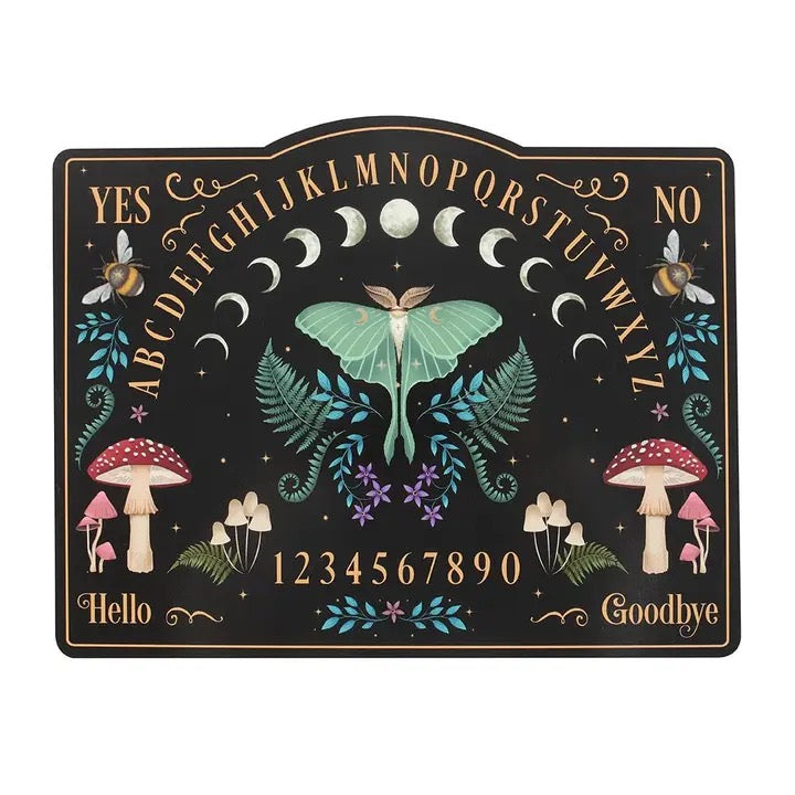 A decorative spirit board with a black background, gold lettering, and whimsical illustrations including a large green moth, crescent moons, bees, mushrooms, flowers, and numbers, shown on a plain white background.
