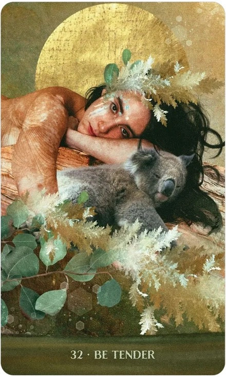 Card with a woman and koala surrounded by foliage, labeled '32 - Be Tender'.