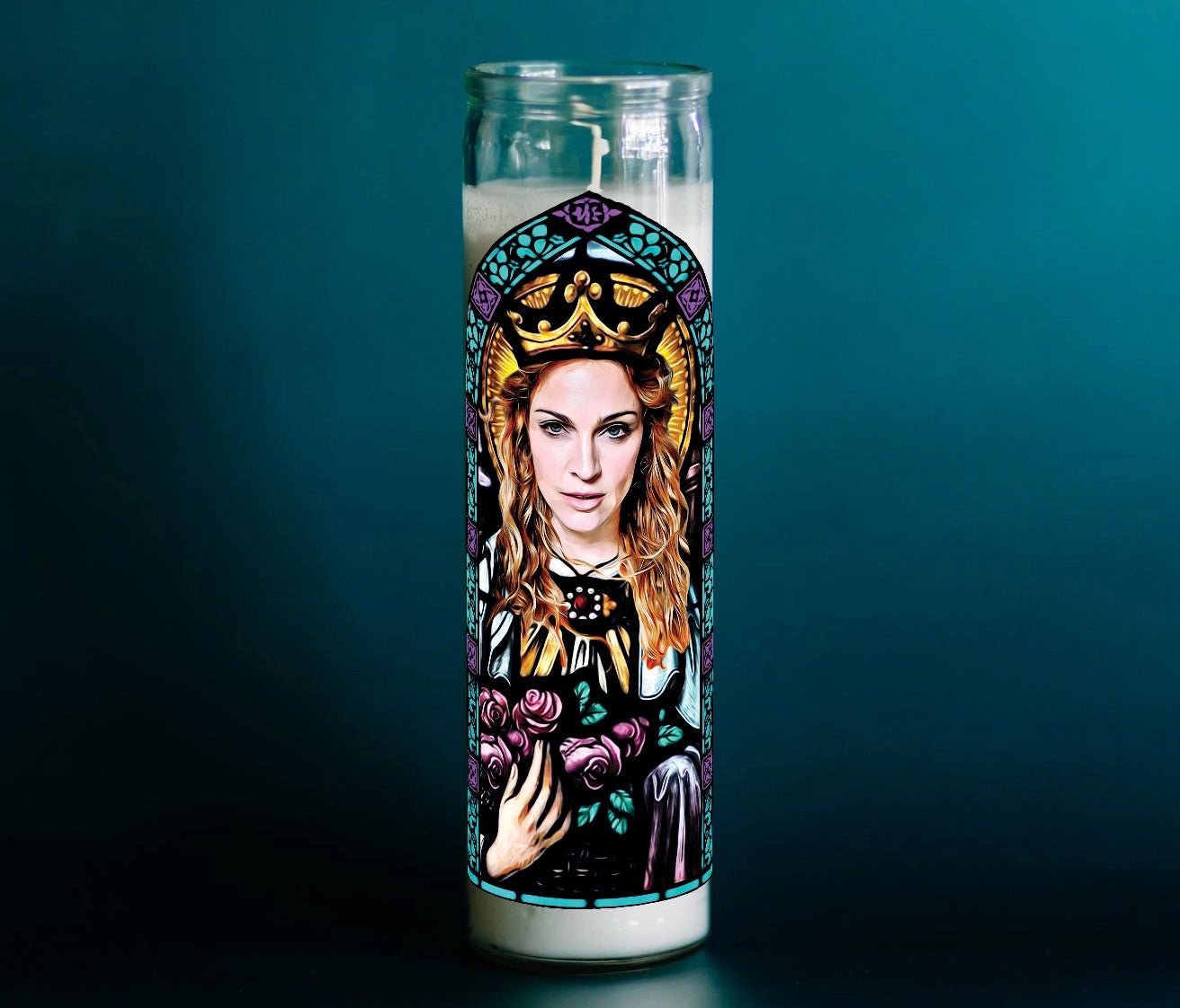 Candle with artistic design on a dark background