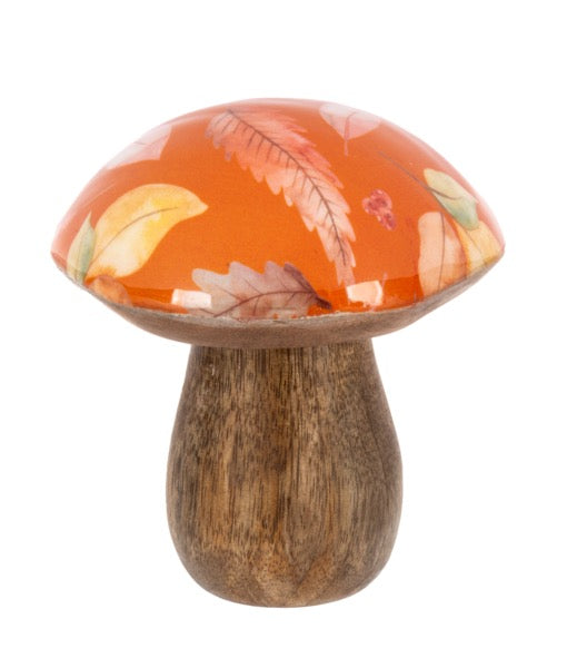 Decorative mushroom with an orange cap and wooden base on a white background