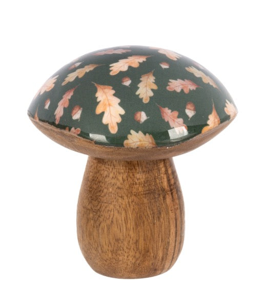 Decorative mushroom with a leaf-patterned cap on a white background