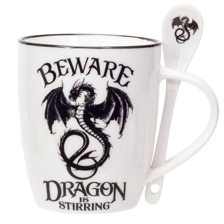 White mug with black dragon design and text 'Beware Dragon is Stirring' on a white background