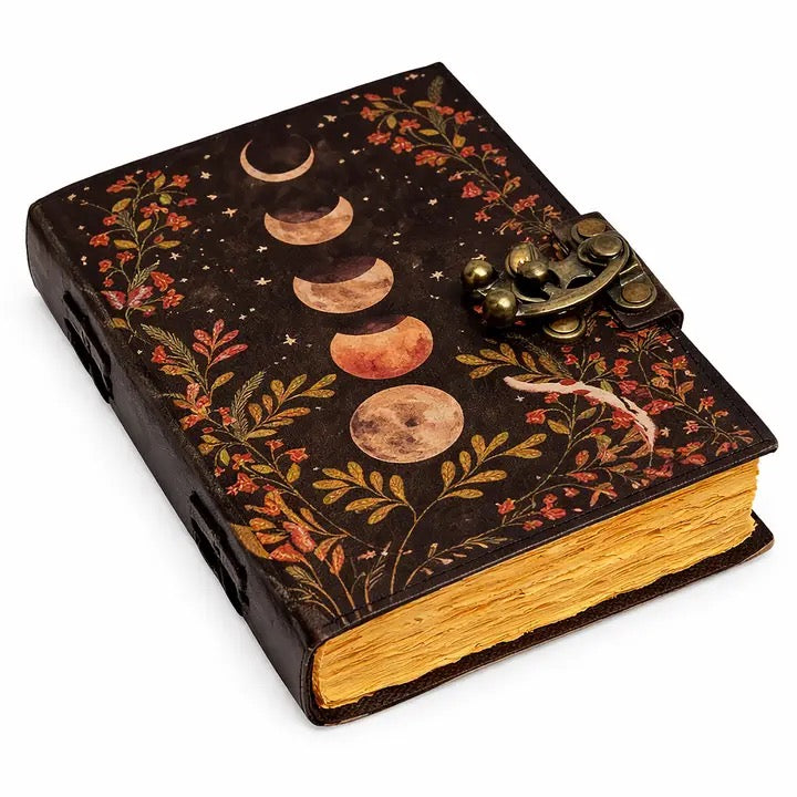 journal  cover of Moon phases with a red and gold design.