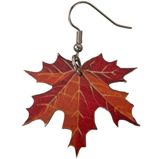 Maple leaf earring on a white background