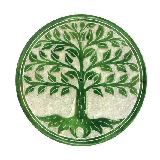 Decorative incense holder with a green tree design on a white background