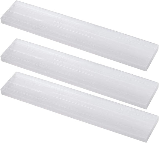 Three white rectangular filters on a white background