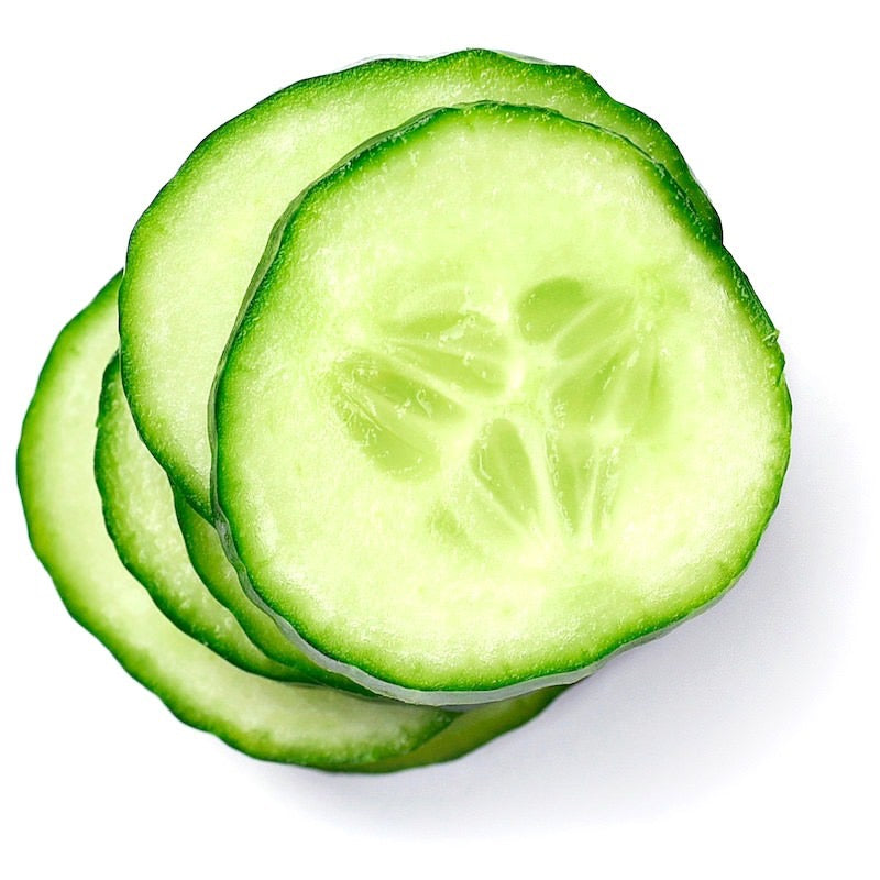 Stack of sliced cucumbers on a white background