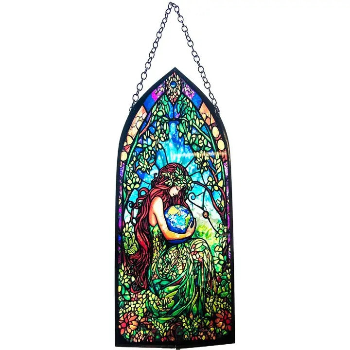 Stained glass panel with a woman holding the Earth, hanging on a white background