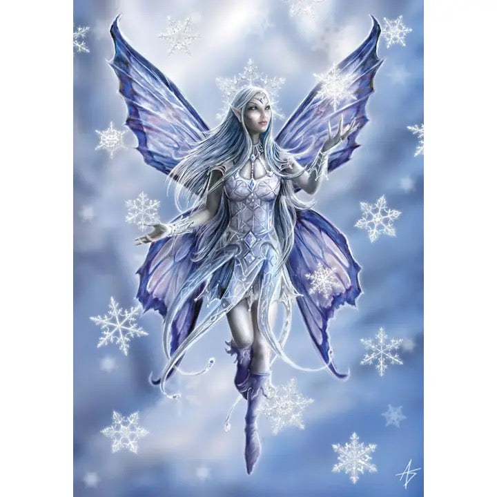 Fairy with purple wings on a snowy background