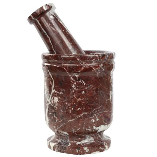 Marble mortar and pestle on a white background
