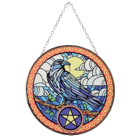 Decorative stained glass panel with a blue bird design on a white background