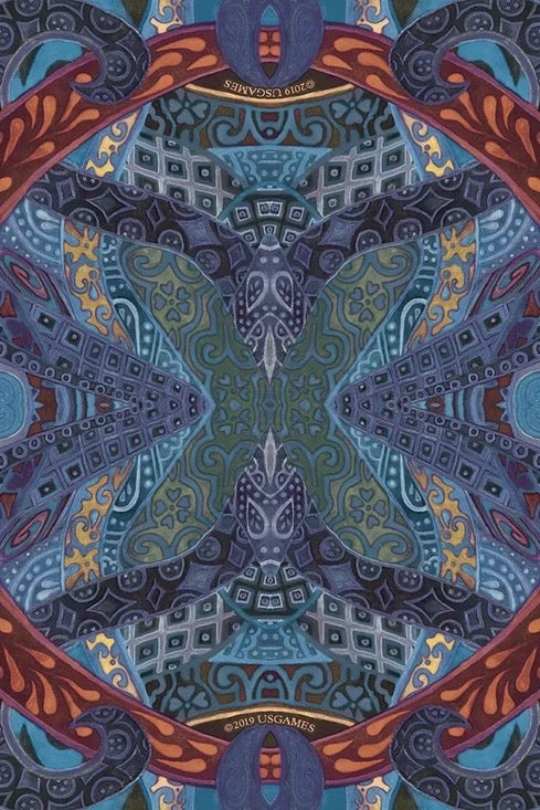 Colorful geometric pattern with intricate design in blue, red, and green.