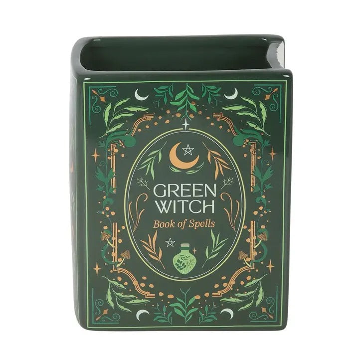 Decorative book titled 'Green Witch Book of Spells' with green and gold design on a white background
