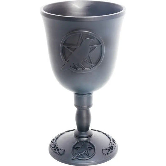 Gray goblet with star and moon design on a white background