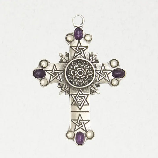 Silver cross pendant with star designs and purple gemstones on a white background