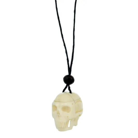 Necklace Bone Skull Carved on a white background.