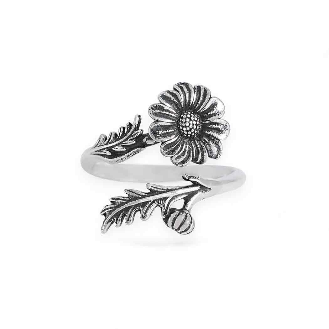 Silver ring with Daisy design on a white background