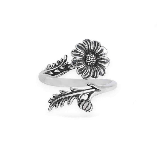 Silver ring with Daisy design on a white background