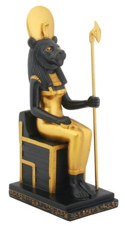 Statue of a seated figure with black panther-like creature on a white background