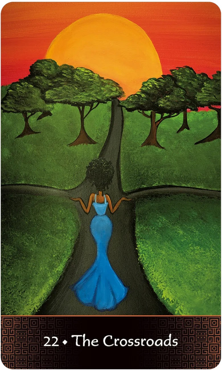 Tarot card titled 'The Crossroads' with a woman in a blue dress standing at a crossroads between two paths, surrounded by trees and a sunset.