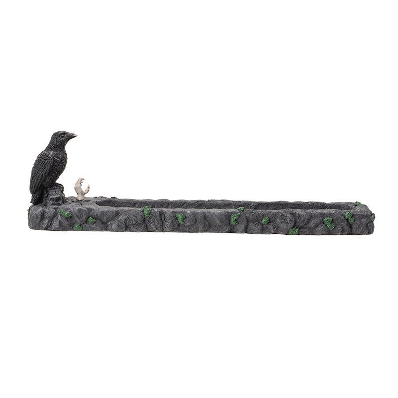 Decorative stone incense burner with a crow on a white background