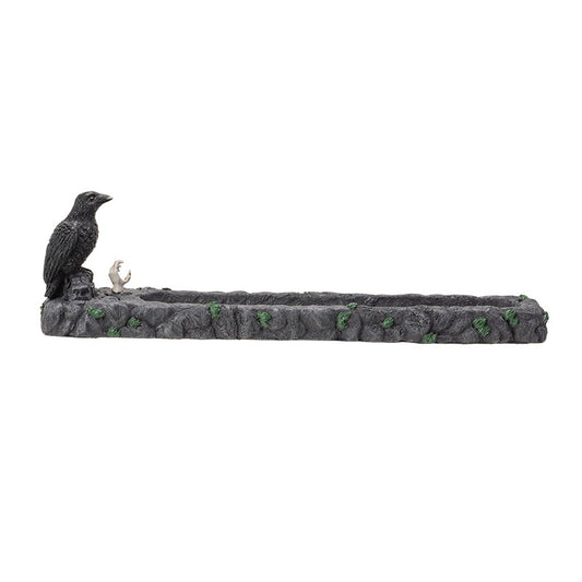 Decorative stone incense burner with a crow on a white background