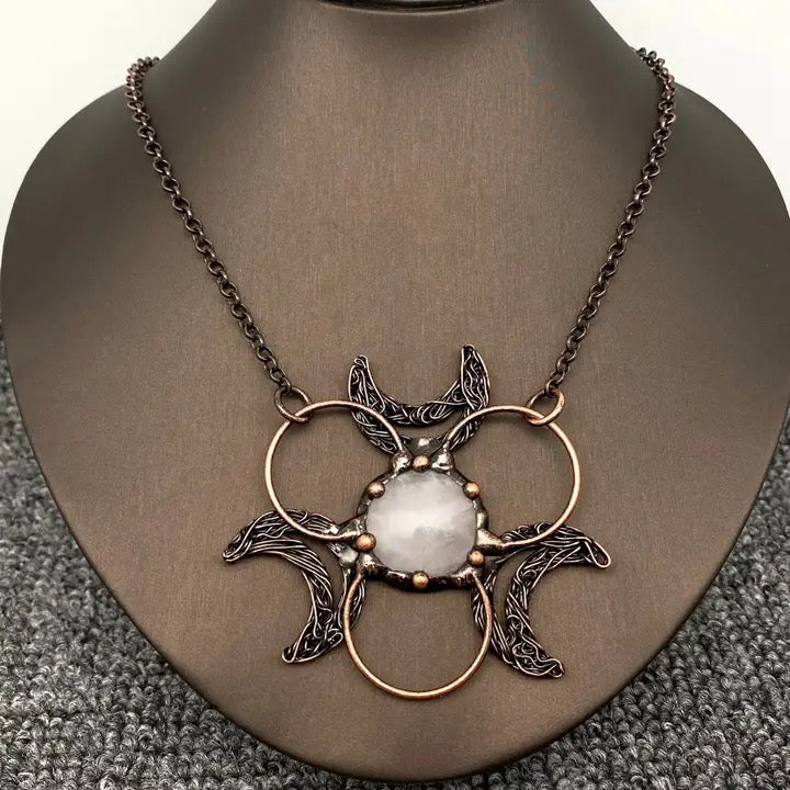 Necklace with a decorative pendant on a mannequin neck