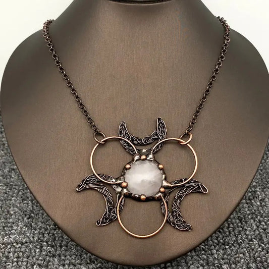 Necklace with a decorative pendant on a mannequin neck