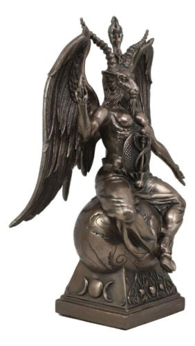 Bronze statue of a winged creature on a white background