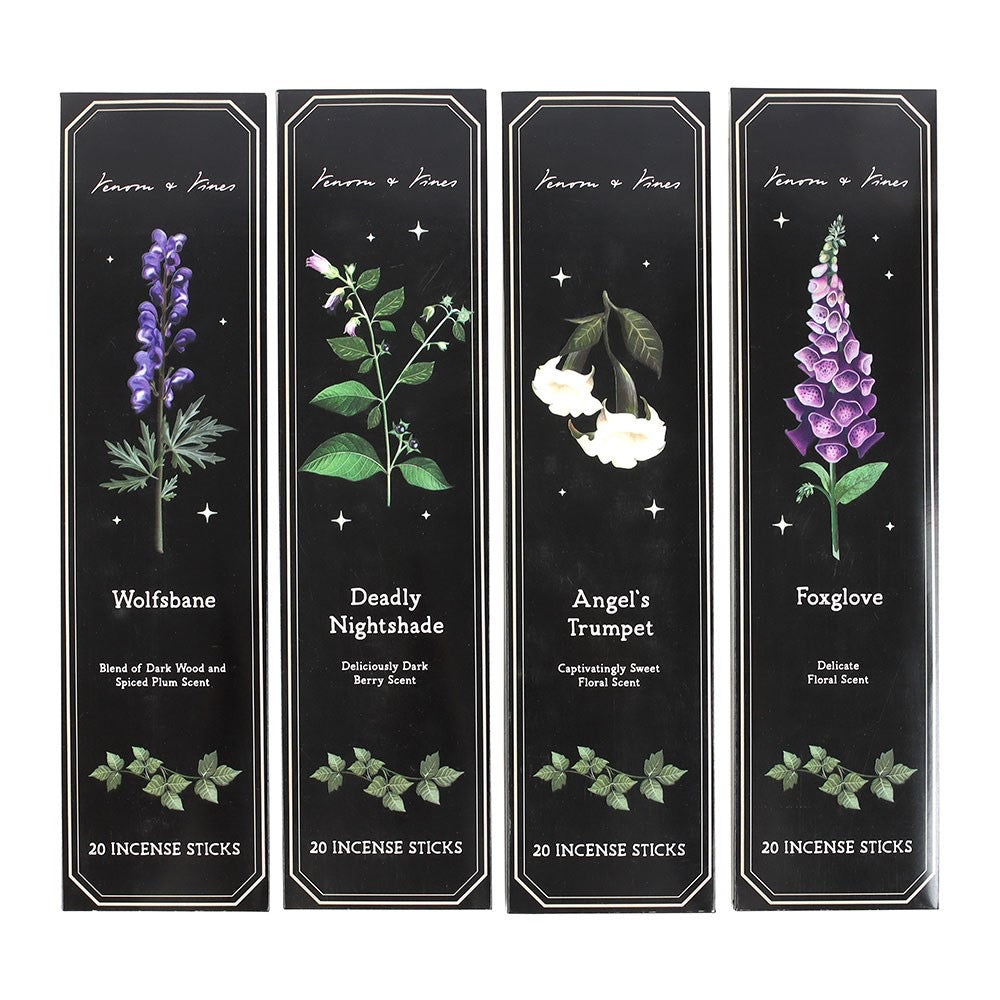 Set of four incense stick packages with floral illustrations and names on a black background.