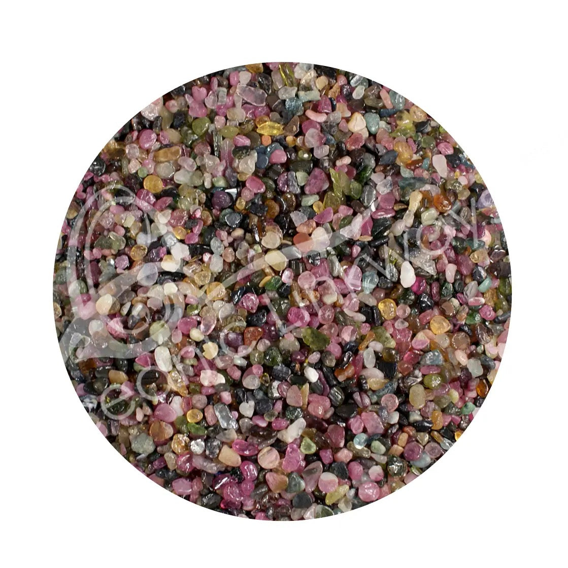 Round container filled with multicolored gemstones on a white background