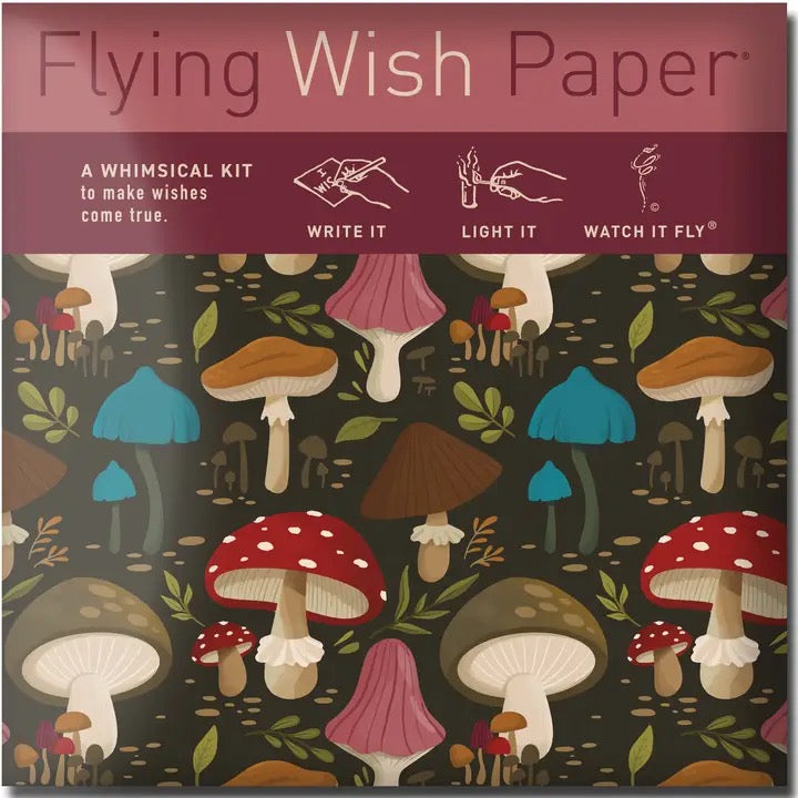 Packaging of 'Flying Wish Paper' with colorful mushroom illustrations on a dark background.