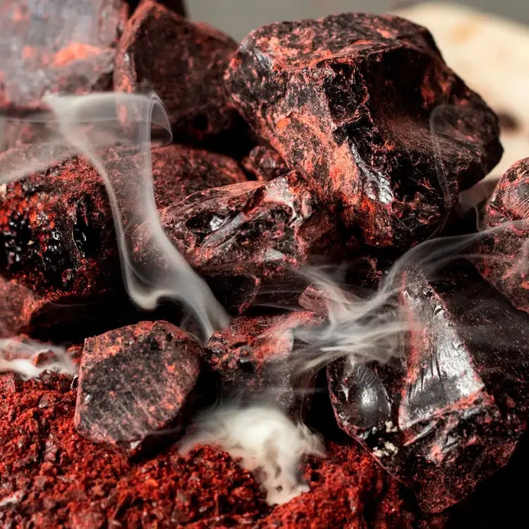Close-up of smoking red-hot dragon's blood burning