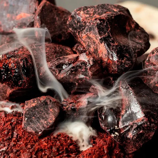 Close-up of smoking red-hot dragon's blood burning