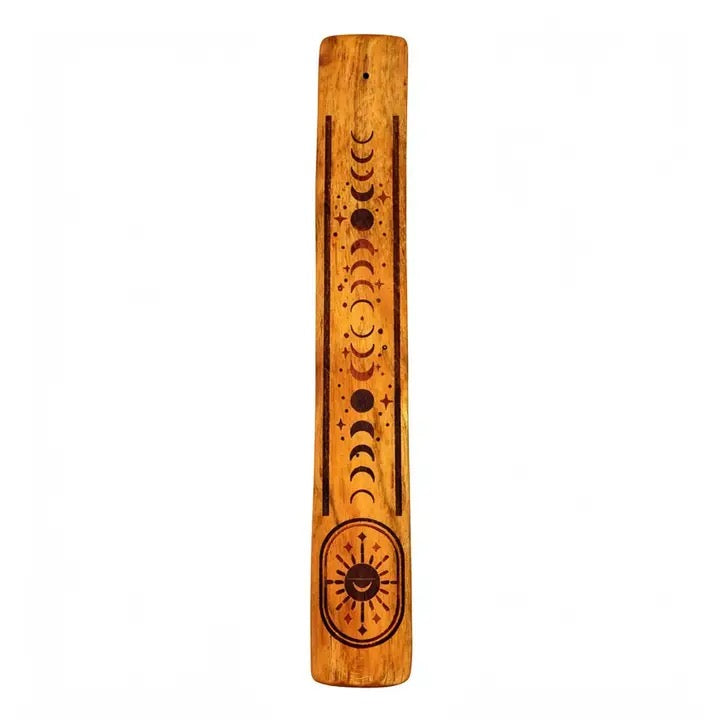 A wooden incense burner featuring a vertical sequence of moon phases and a sun symbol engraved or printed in dark brown on a warm honey-toned wood background, shown against a plain white background.