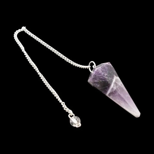 Amethyst crystal pendulum on a black background